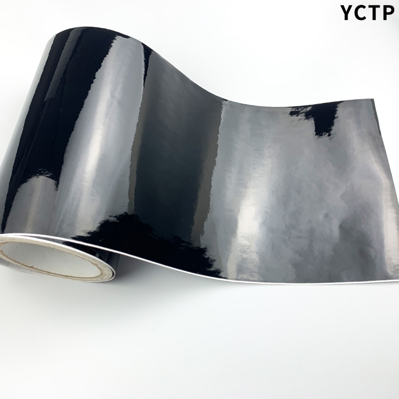 الكلاسيكية لامعة الأسود الفيني - مراجعة Console Skin Wrap وسعره